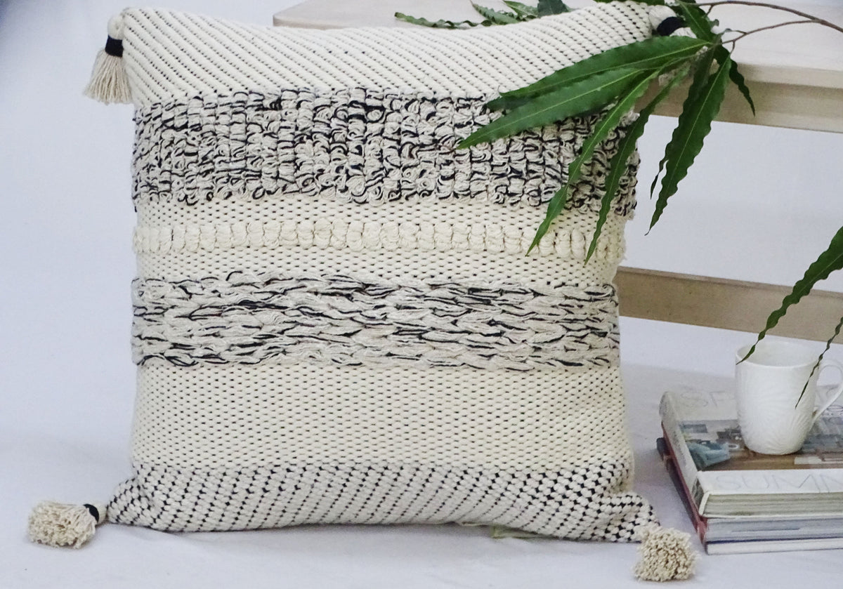 Vibhsa cream knit 22x22 throw pillow with tassels, chunky textured weave on Tampa Home & Garden Store