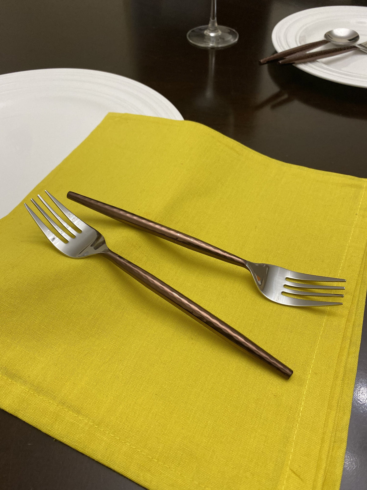 Vibhsa stainless steel dinner forks set of 6 with brown hammered handles on yellow napkin on Tampa Home & Garden Store