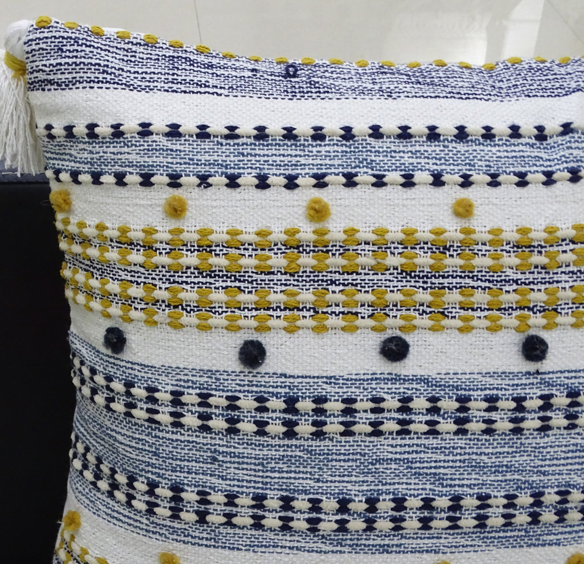 Vibhsa 20x20 throw pillow multicolor navy white stripe with mini poms and tassels on Tampa Home & Garden Store