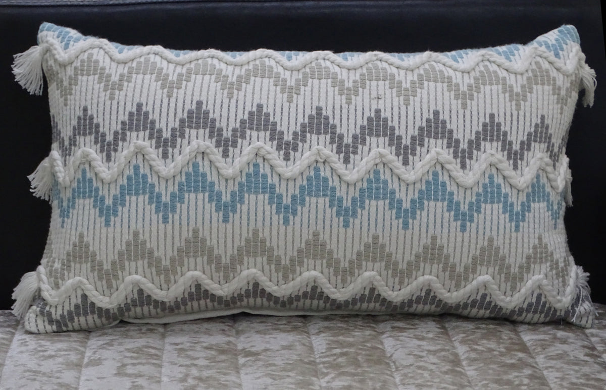 Chevron throw pillow by Vibhsa with braided tassels, white/blue geometric pattern, 14x24 on Tampa Home & Garden Store