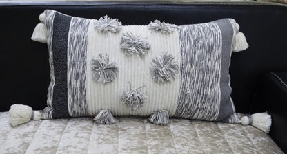 Vibhsa grey melange striped lumbar pillow 14x24 with large pom-poms and tassels on Tampa Home & Garden Store