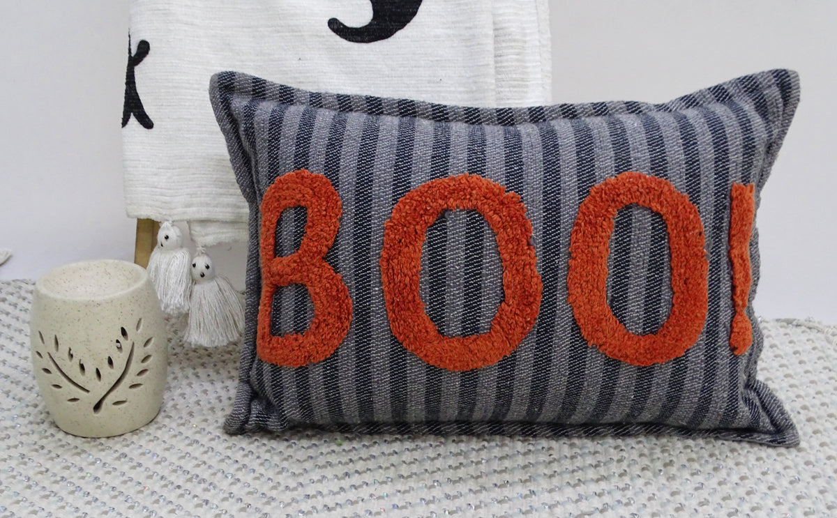 Vibhsa throw pillow blue striped denim-style fabric with textured orange BOO letters on Tampa Home & Garden Store