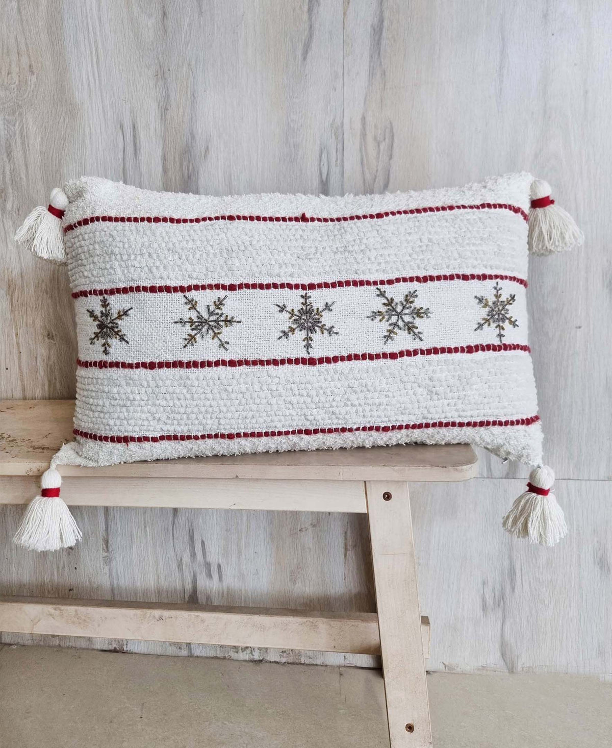 Vibhsa Christmas throw pillow 14x24 with white textured fabric, red stripe and tassel corners on Tampa Home & Garden Store