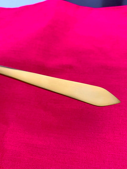 Flatware knife Vibhsa Taj Look gold stainless on pink fabric on Tampa Home & Garden Store