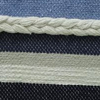 Throw Pillow handwoven braided textured stripe decor by Vibhsa in beige and denim blue on Tampa Home & Garden Store
