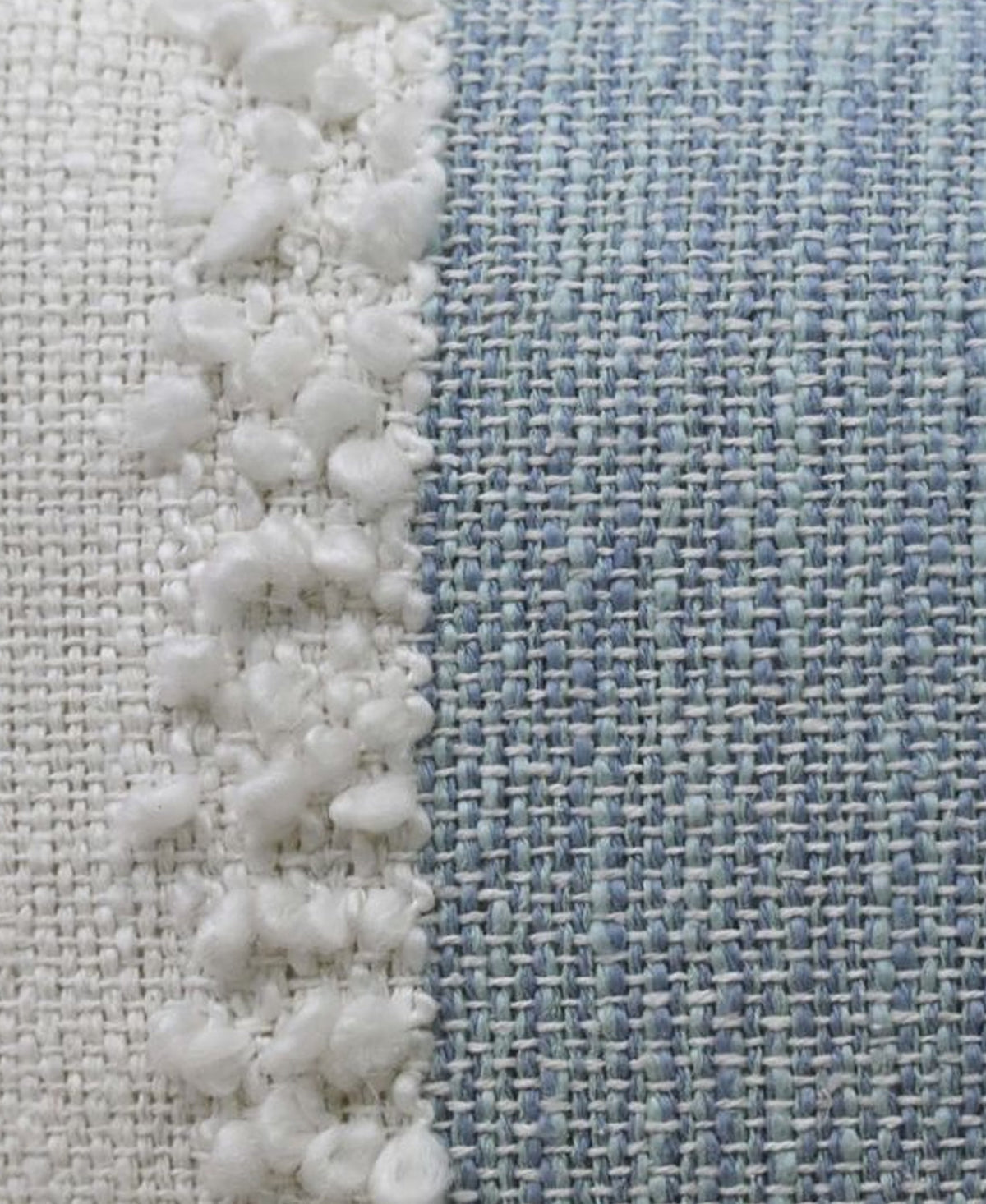 Vibhsa handloom woven textured throw pillow with insert in blue white pom-pom fringe on Tampa Home & Garden Store