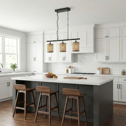 Elysian three-light island pendant lamp, black metal frame with natural rattan shades, chain-hung over white kitchen island on Tampa Home & Garden Store