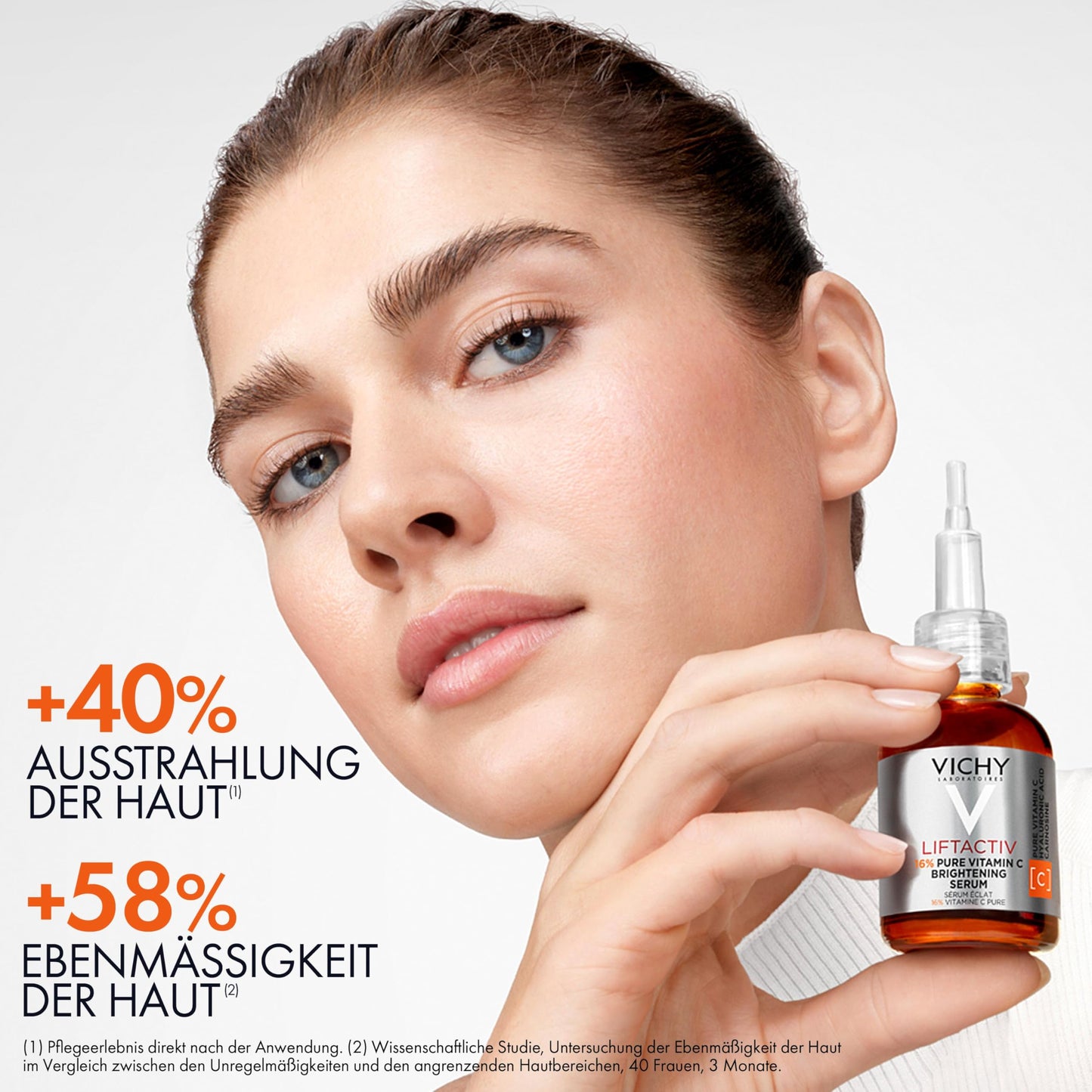 Vichy Liftactiv 15% Pure Vitamin C Serum bottle held near model's face skincare product on Tampa Home & Garden Store