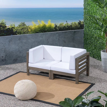 Oana 2-Piece Loveseat Set with water resistant cushions, wood outdoor frame near sea on Tampa Home & Garden Store