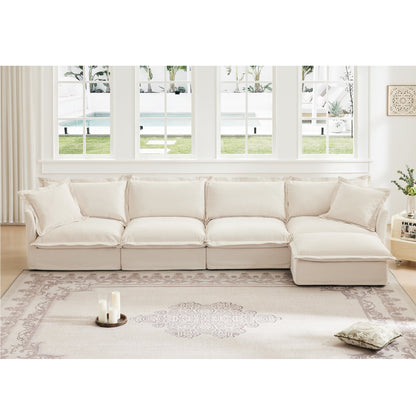 Slipcovered L-shaped 4-seat beige sofa by HouseOfZazla in a living room with a patterned rug on Tampa Home & Garden Store