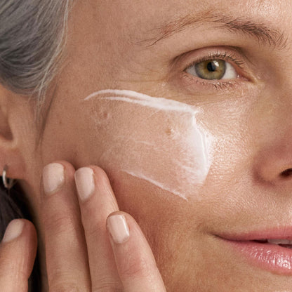 Dermalogica PowerBright Dark Spot Treatment Serum being applied as white cream on face on Tampa Home & Garden Store