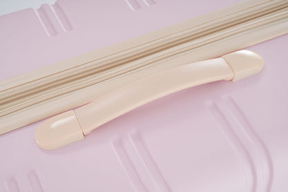 Luggage zipper close-up on beige hardside suitcase fabric on Tampa Home & Garden Store