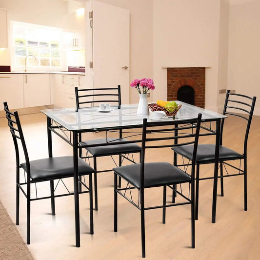 Dining set with tempered glass top table and four black upholstered chairs in a metal frame on Tampa Home & Garden Store
