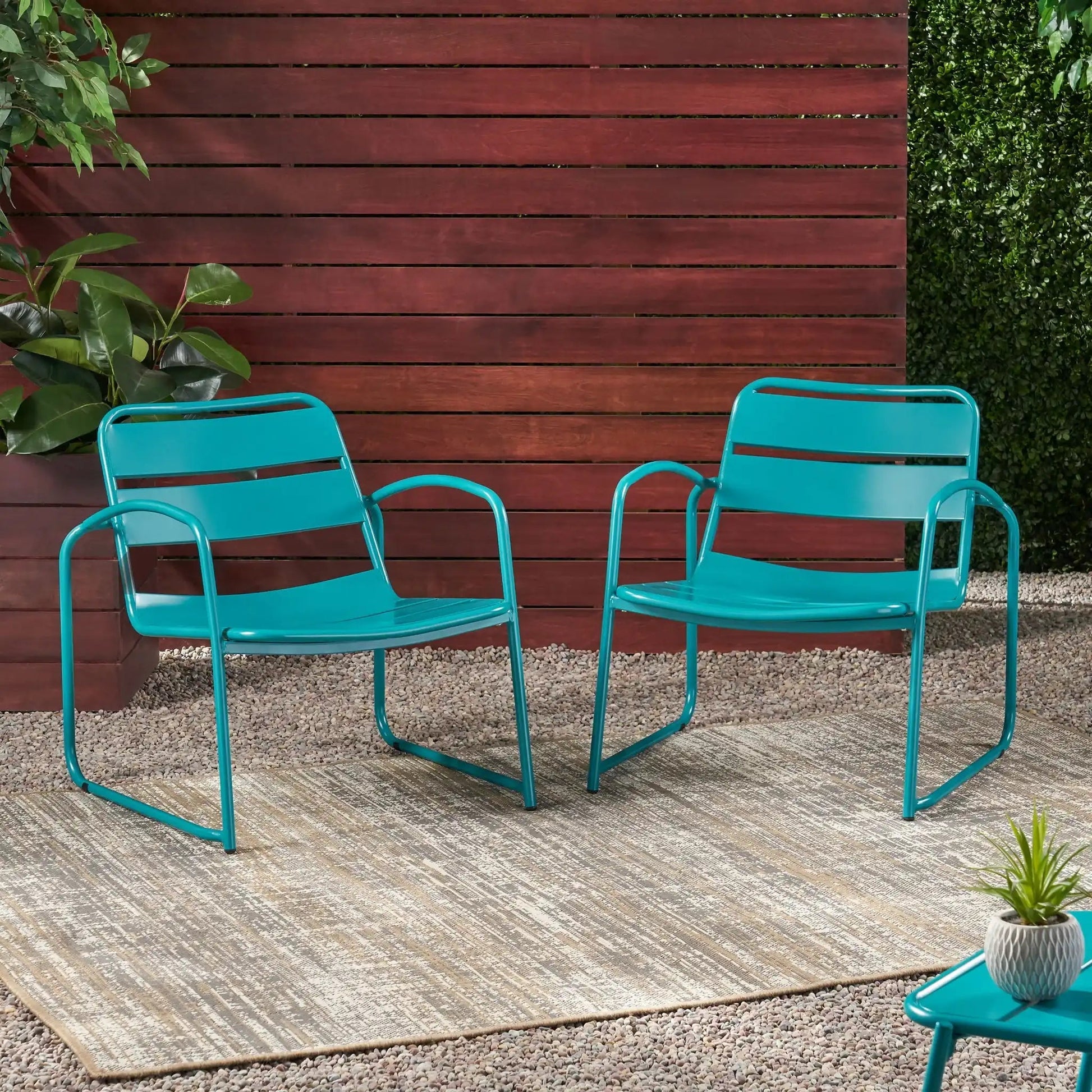 Conrad Outdoor Chair turquoise metal armchairs by HouseOfZazla for outdoor spaces, three shown on Tampa Home & Garden Store