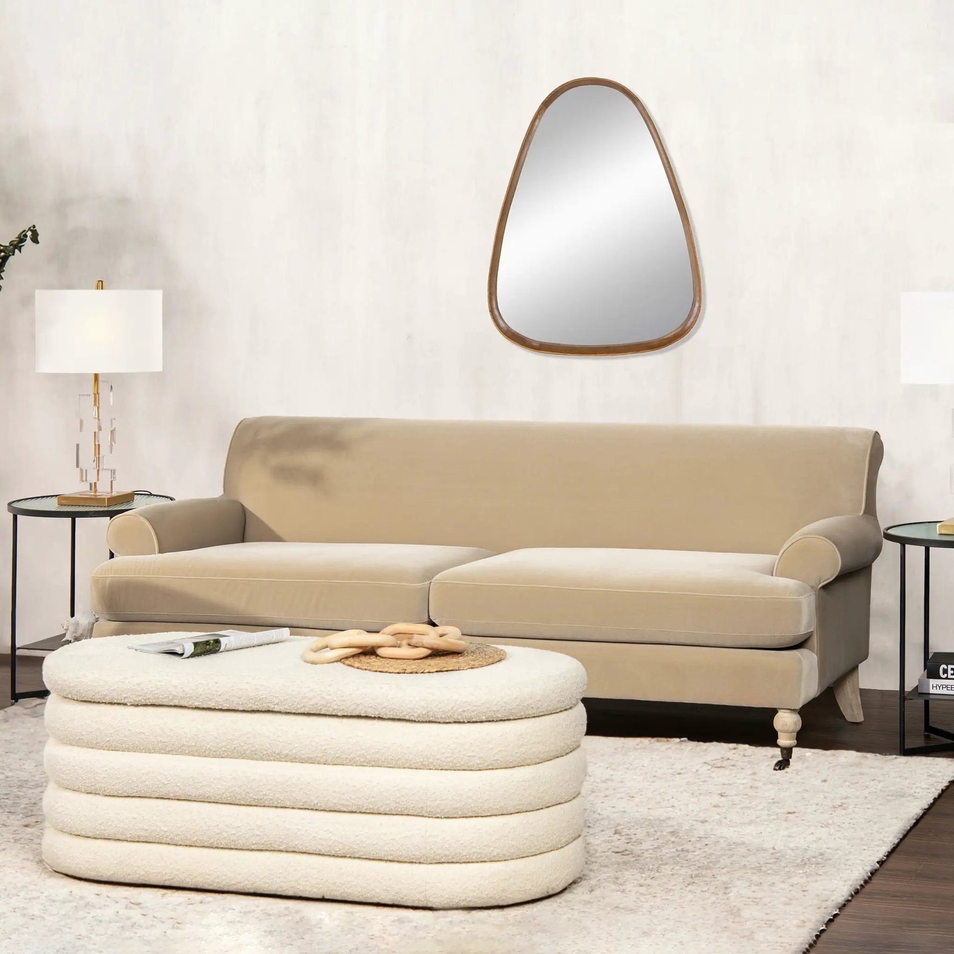 Alana Lawson two cushion tightback beige sofa by Unique Piece Furniture with round ottoman on Tampa Home & Garden Store