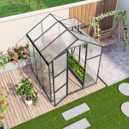 Windproof greenhouse with raised base, polycarbonate panels, black frame on a wooden deck with potted plants on Tampa Home & Garden Store