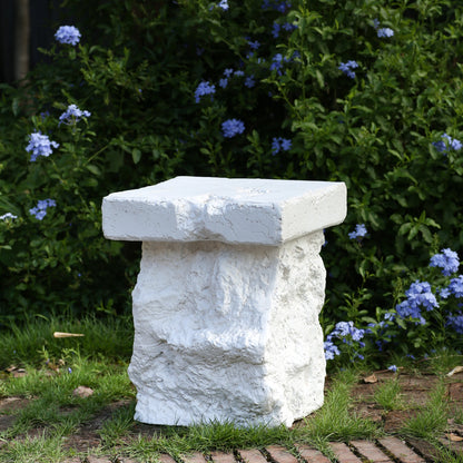 Talia Outdoor MGO Side Table white textured stone finish in garden setting on Tampa Home & Garden Store