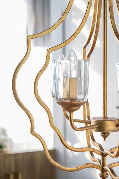 Gold metal chandelier with curved arms and glass candle holder by HouseOfZazla, 4-light on Tampa Home & Garden Store