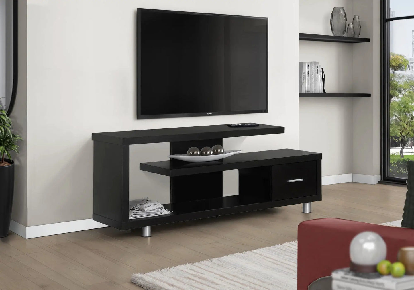 Black contemporary TV stand console with open shelf and drawer, modern entertainment center on Tampa Home & Garden Store