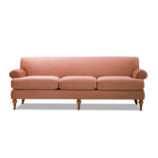 Alana Lawson three-cushion tightback sofa in coral pink with rolled arms and turned legs on Tampa Home & Garden Store