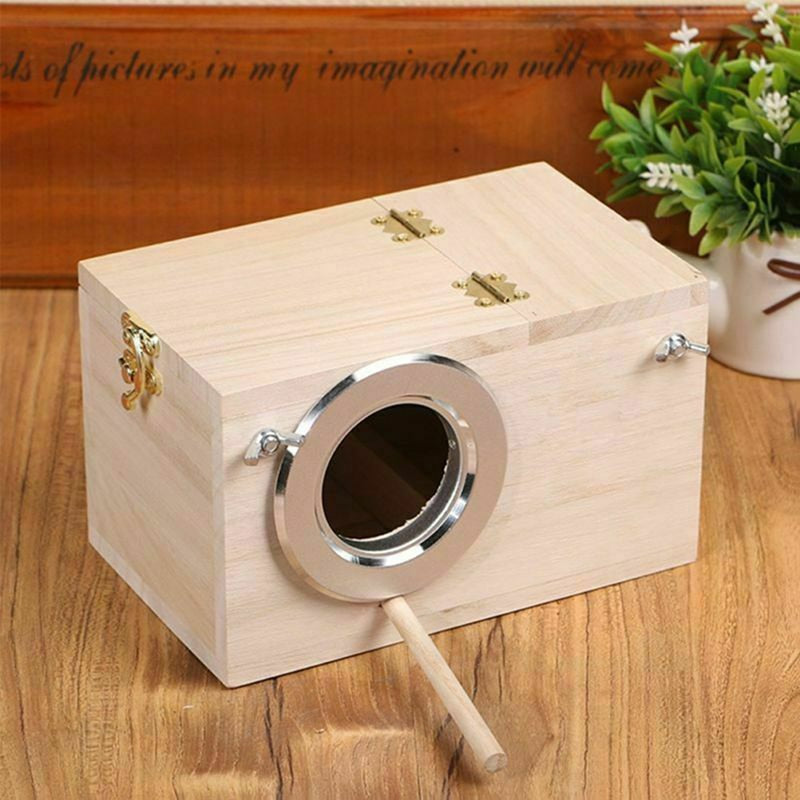 Wooden birdhouse with silver metal ring entrance and front perch by Sell My Stuff on Tampa Home & Garden Store