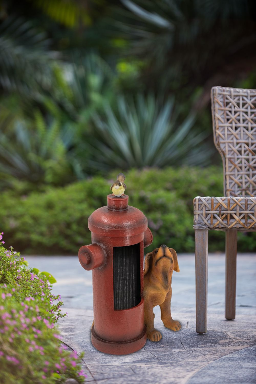 Red hydrant water fountain with a small dog and perched bird HouseOfZazla on Tampa Home & Garden Store