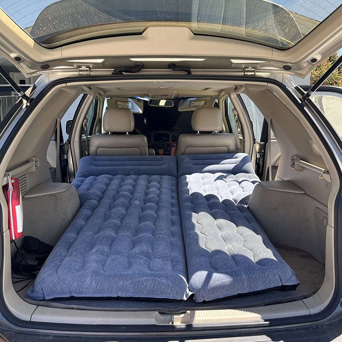 Umbrauto SUV air mattress 1.0 in gray laid flat in SUV cargo area on Tampa Home & Garden Store