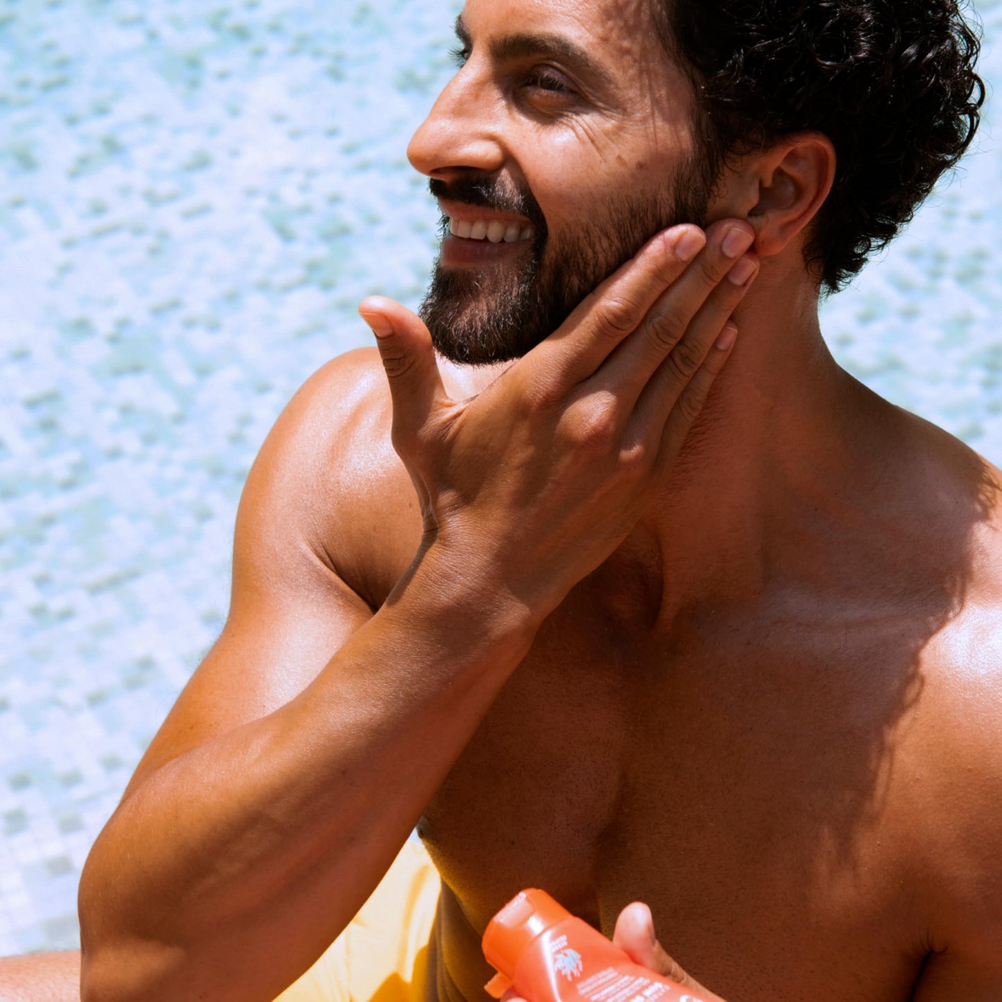 Sunscreen SVR Extreme Sun Secure Ultra Matt Gel SPF50+ orange bottle held by man applying on Tampa Home & Garden Store