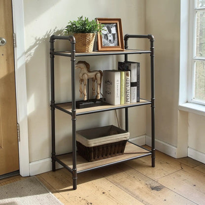 Itzel Bookshelf etagere with black metal frame and light wood shelves, top plant in woven basket and photo frame on Tampa Home & Garden Store