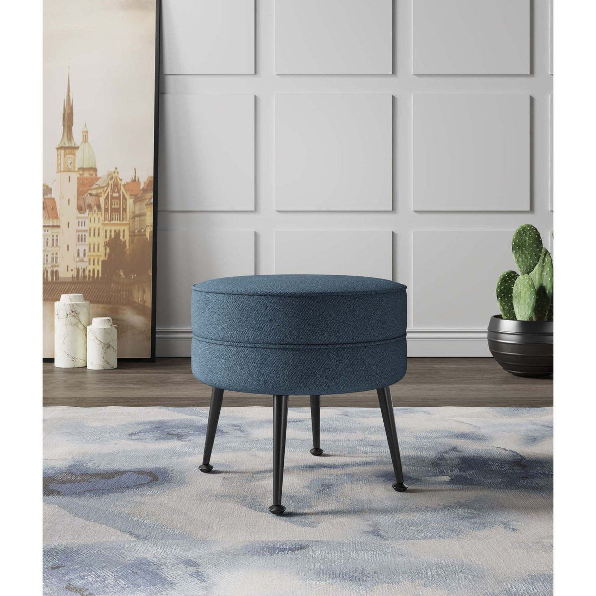 Bailey Accent Ottoman, round blue upholstered ottoman with black metal legs on Tampa Home & Garden Store