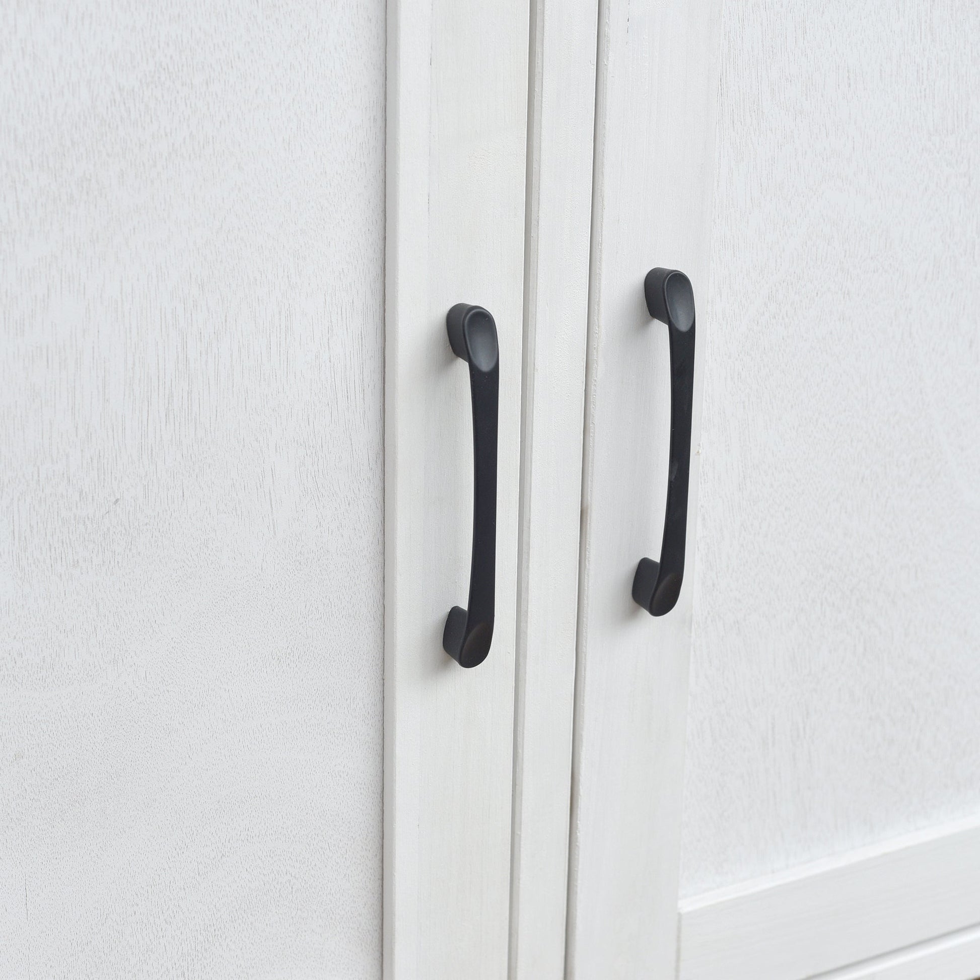 White wooden outdoor kitchen island storage cabinet doors with black metal handles on Tampa Home & Garden Store