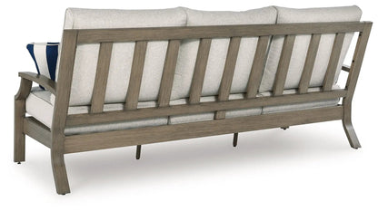 Rainier Ranch sofa with beige cushions, brown wood frame, slatted back by Unique Piece Furniture on Tampa Home & Garden Store
