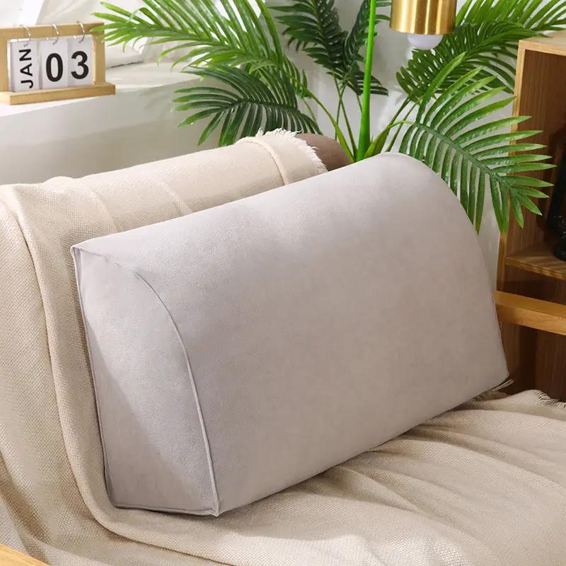Removable and washable gray sofa cushion on a beige couch in a cozy living room on Tampa Home & Garden Store