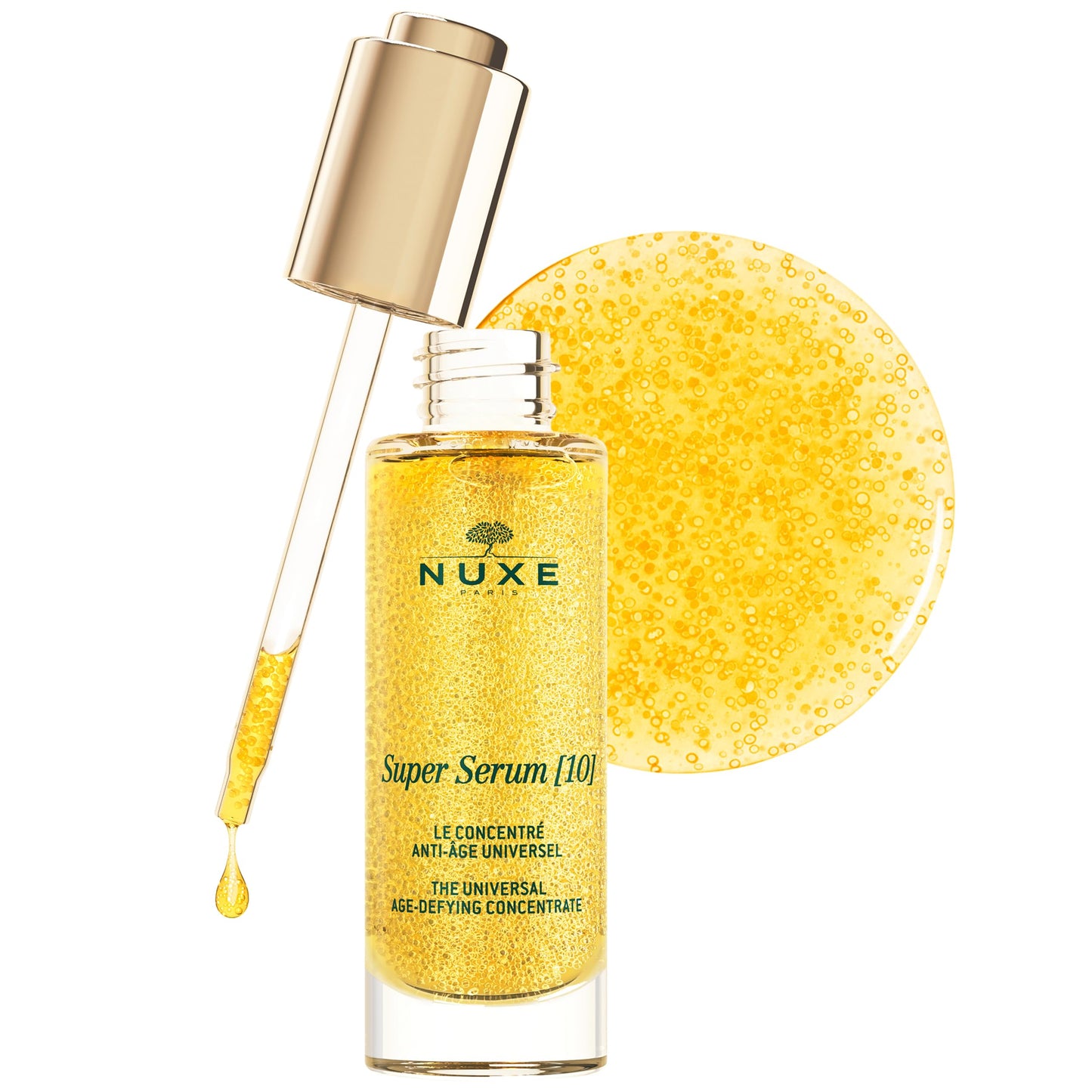 Nuxe Super Serum 10 face serum bottle with dropper, golden liquid and gold backdrop on Tampa Home & Garden Store