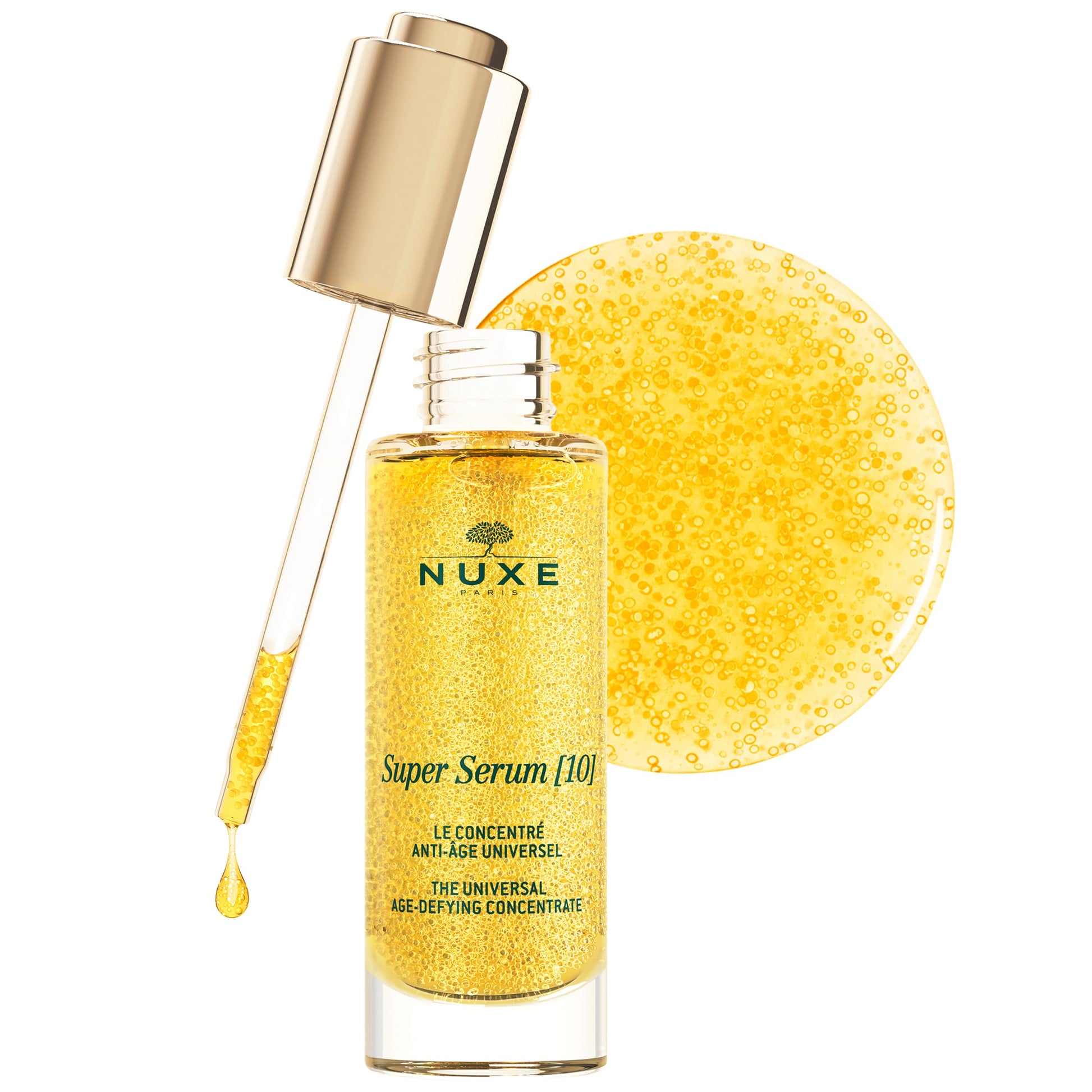 Nuxe Super Serum 10 face serum bottle with dropper, golden liquid and gold backdrop on Tampa Home & Garden Store