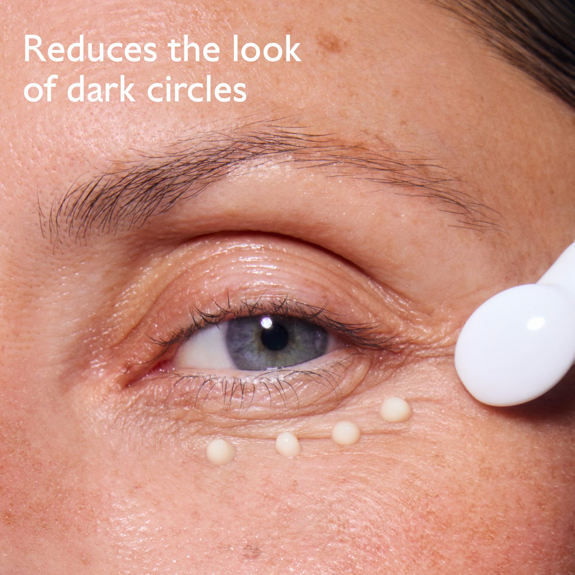 Caudalie Vinoperfect Brightening Eye Cream for dark circles; eye area with cream droplets on Tampa Home & Garden Store