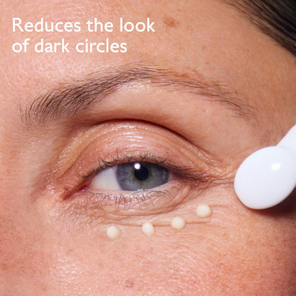 Caudalie Vinoperfect Brightening Eye Cream for dark circles; eye area with cream droplets on Tampa Home & Garden Store