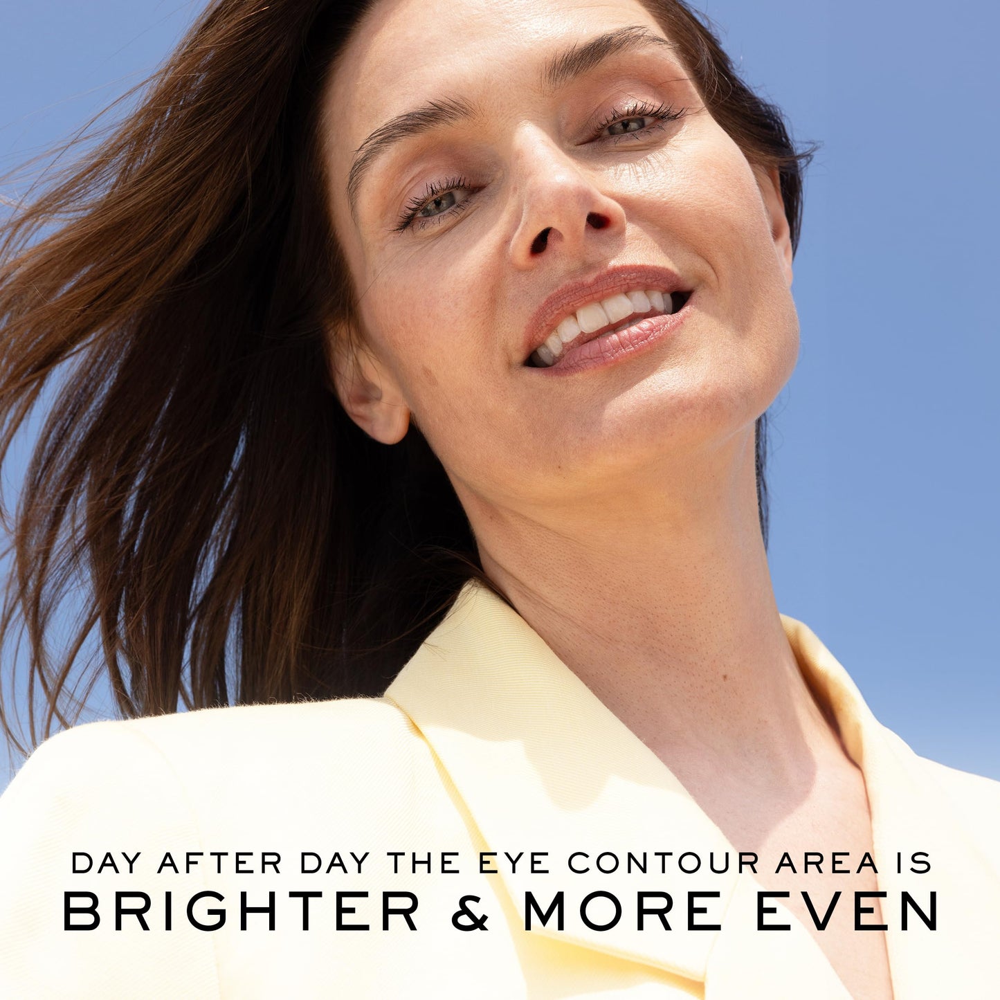Nuxe Nuxuriance Gold anti-aging serum Beauty Care Bag close-up of a smiling woman outdoors under blue sky on Tampa Home & Garden Store