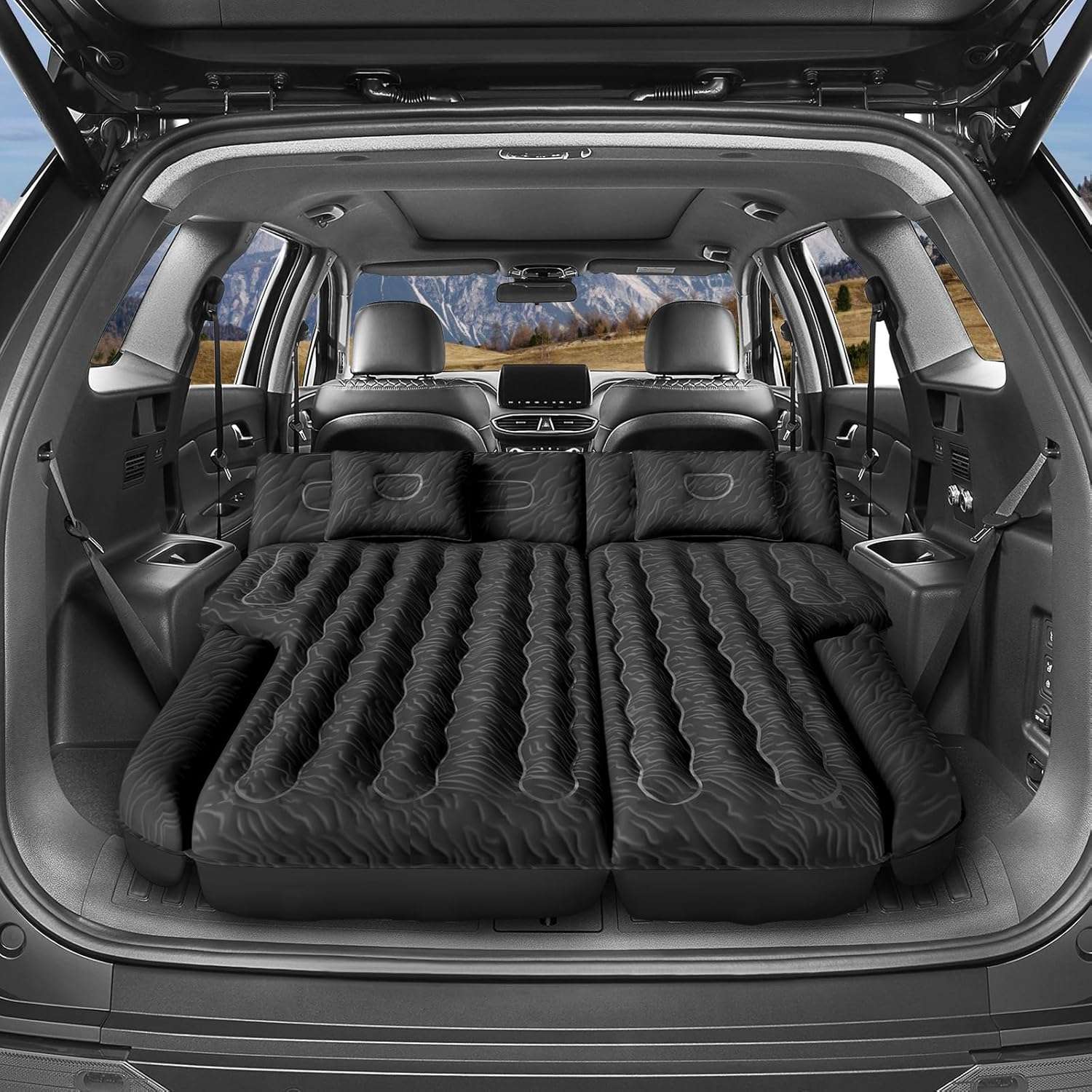 Dikasun Outdoor 63in Extended SUV Mattress in black with pump and 2 pillows in SUV cargo area on Tampa Home & Garden Store