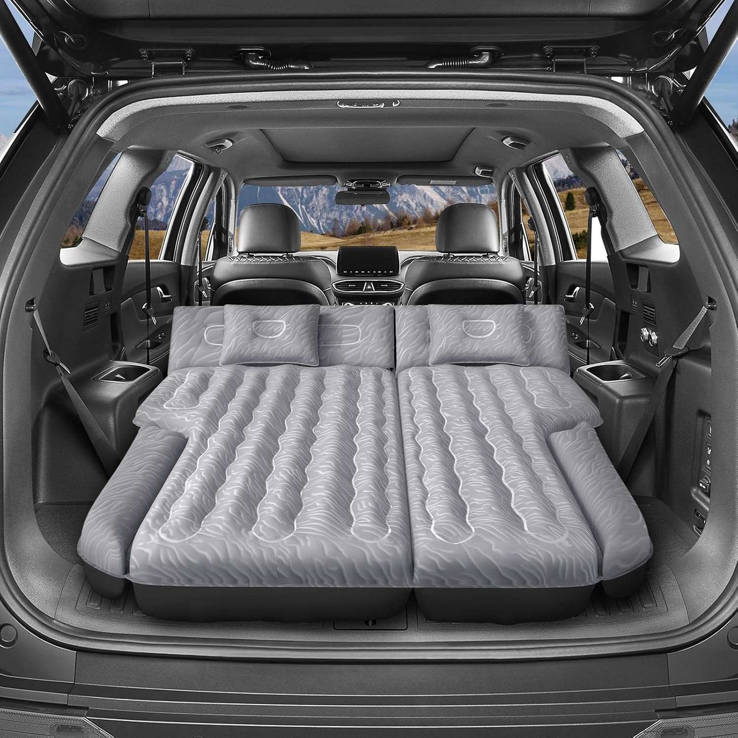 Dikasun Outdoor SUV mattress 63in extended, grey, inflated inside SUV with pillows on Tampa Home & Garden Store