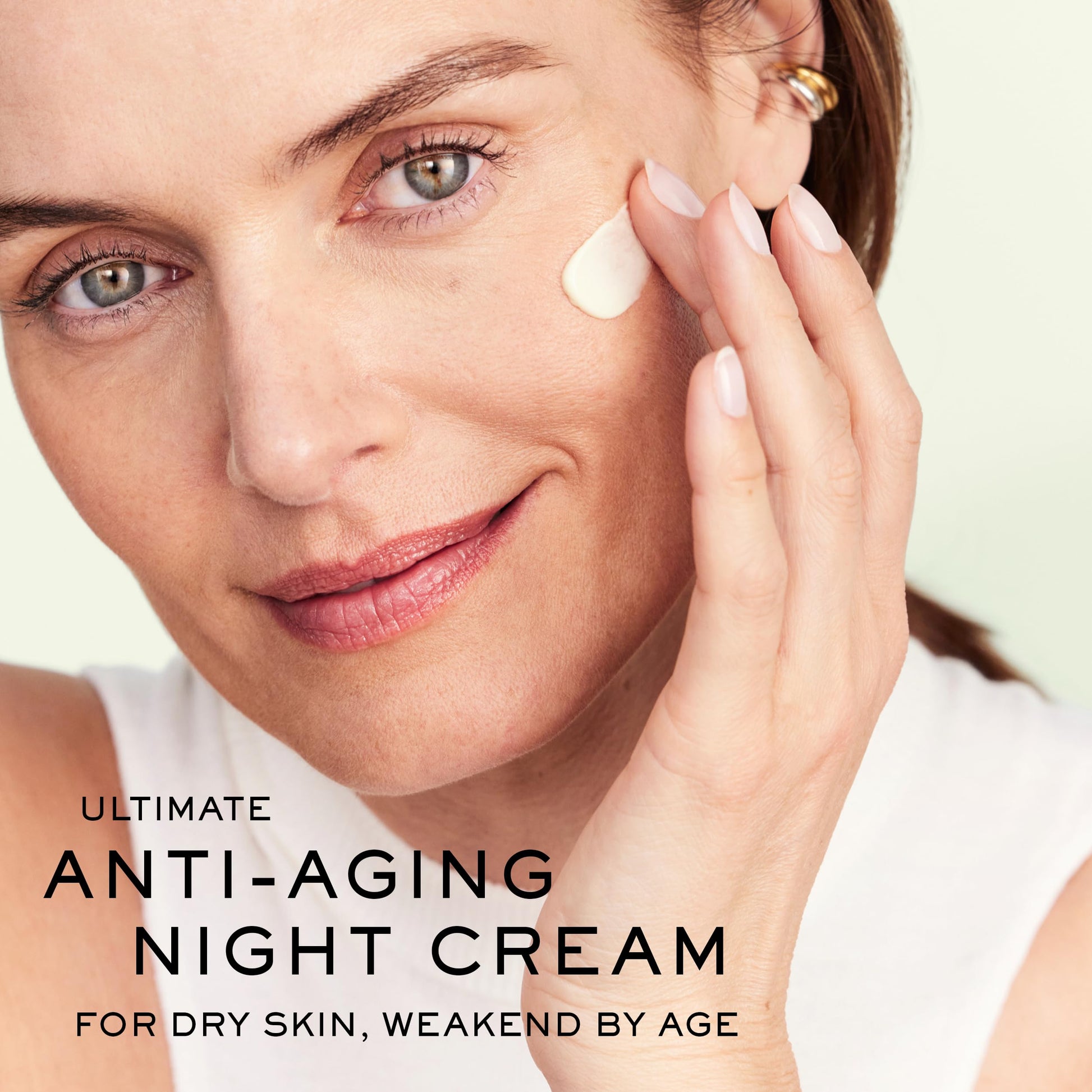 Face cream application close-up; Nuxe Nuxuriance Gold Anti-Aging Night Balm on Tampa Home & Garden Store