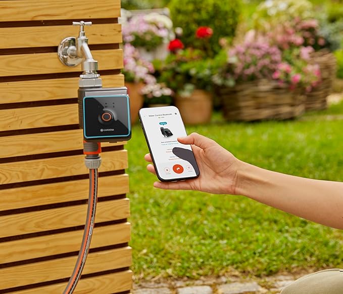 Gardena Water Control Bluetooth watering device with square controller on faucet; app shown on Tampa Home & Garden Store