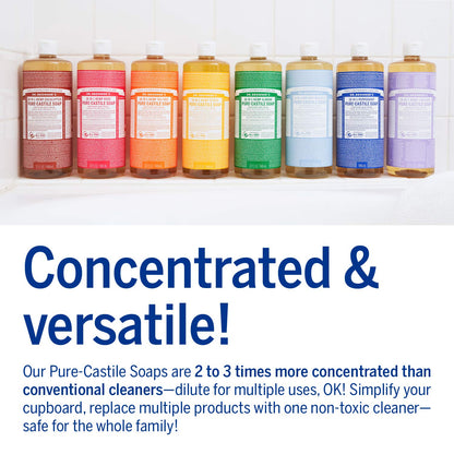 Eight Dr. Bronner's Pure-Castile Soap bottles in rainbow colors lined up on a tiled shelf on Tampa Home & Garden Store