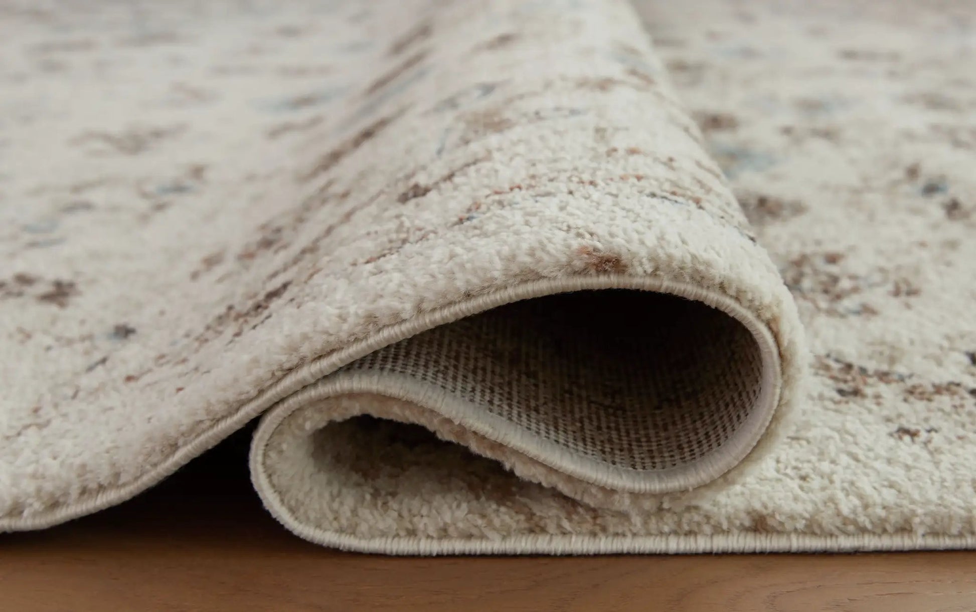 Jossler Rug, beige plush area rug with subtle speckled pattern by Unique Piece Furniture on Tampa Home & Garden Store