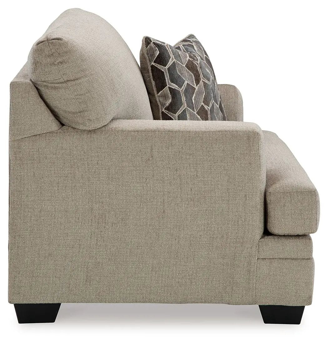 Stonemeade 3-piece living room set in beige textured fabric with geometric pillows on Tampa Home & Garden Store
