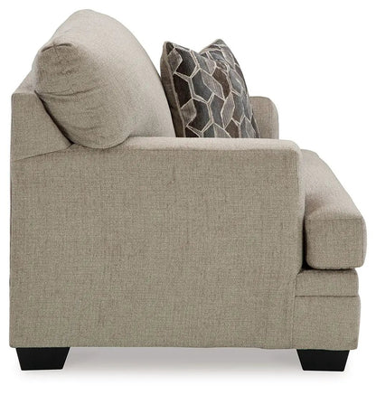 Stonemeade 3-piece living room set in beige textured fabric with geometric pillows on Tampa Home & Garden Store