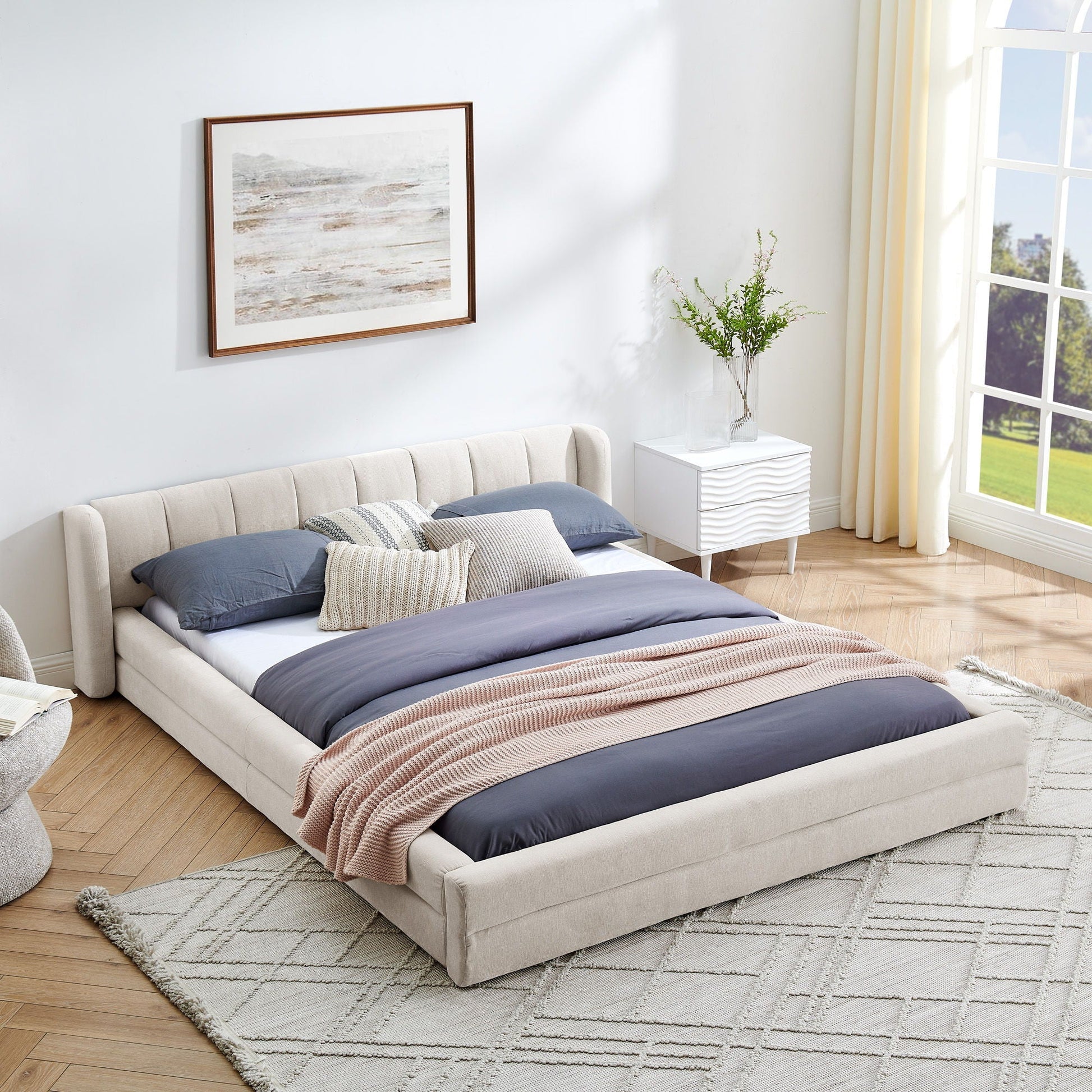 Modern upholstered bed frame in beige fabric with thick headboard and bedding by HouseOfZazla on Tampa Home & Garden Store