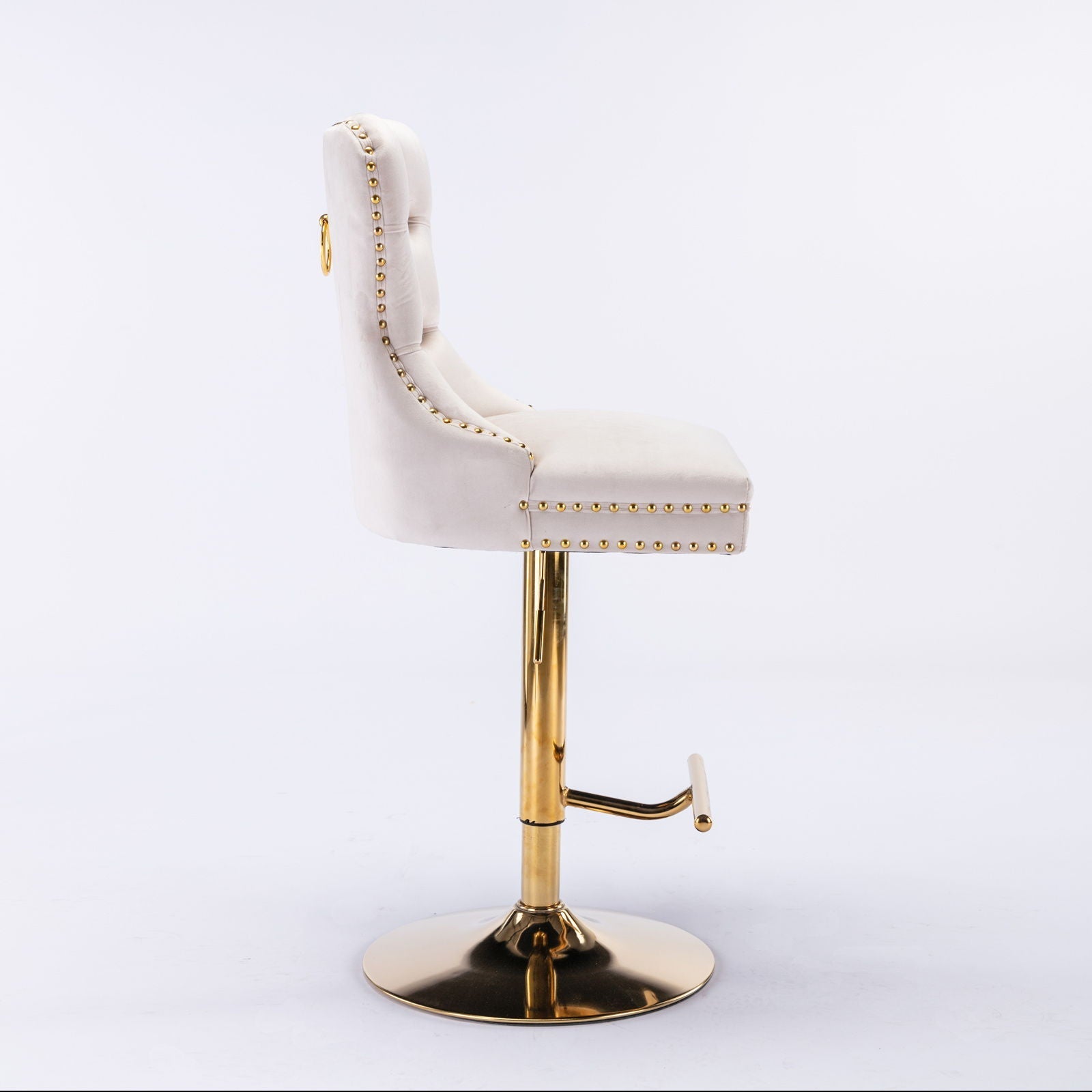 White tufted swivel bar stool with gold nailhead trim and brass pedestal, adjustable height on Tampa Home & Garden Store