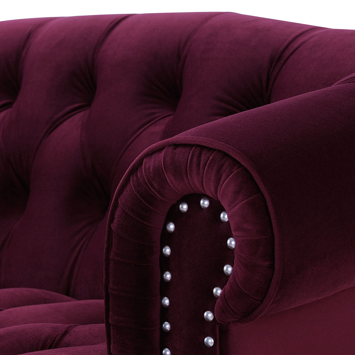 Victorian Chesterfield loveseat in dark red velvet with tufted arms and nailhead trim on Tampa Home & Garden Store