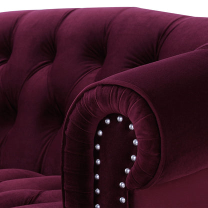 Victorian Chesterfield loveseat in dark red velvet with tufted arms and nailhead trim on Tampa Home & Garden Store